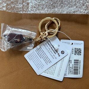 NWT Lululemon Everywhere Belt Bag Charm Keychain Goodnight Plum Gold